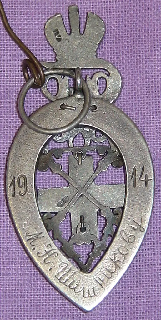 Знак жертвователя в пользу Мариинской барачной лечебницы. Реверс. 